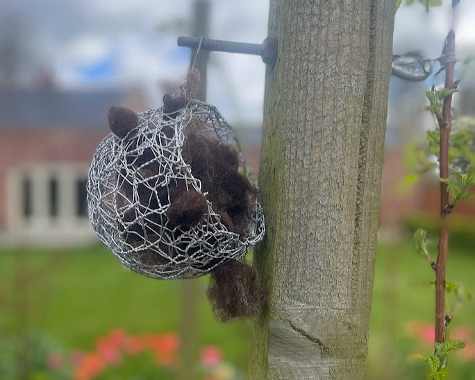 nesting wool in wiring ball