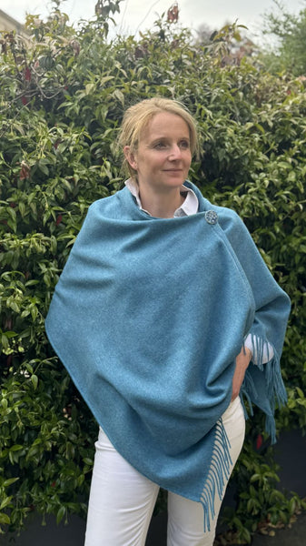 Fringed Merino Wool Poncho Ocean Blue with matching ceramic button