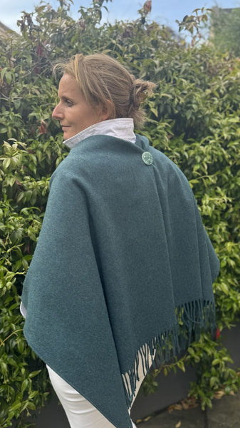 Fringed Merino wool Poncho teal with matching ceramic button