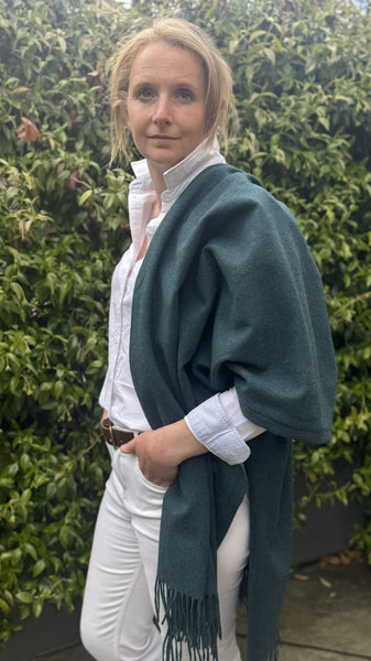Fringed Merino wool Poncho teal with matching ceramic button
