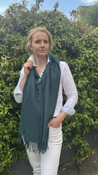 Fringed Merino wool Poncho teal with matching ceramic button