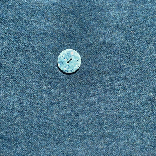Fringed Merino wool Poncho teal with matching ceramic button