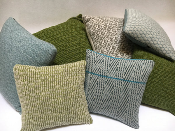 collection of knitted merino lambswool cushions