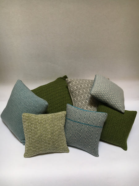 collection of knitted merino lambswool cushions